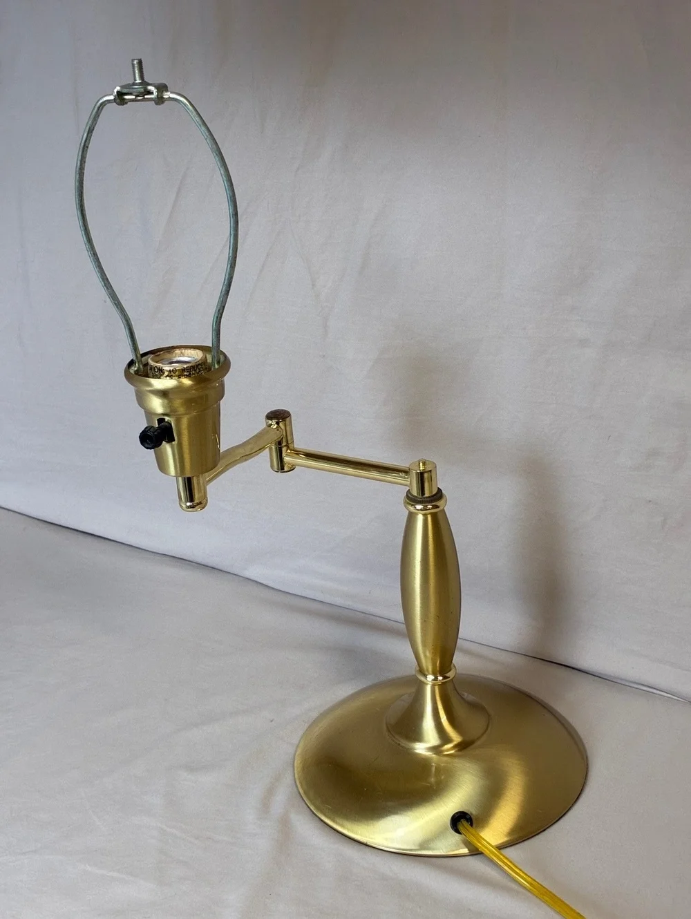Brass Hampton Bay swing arm lamp
